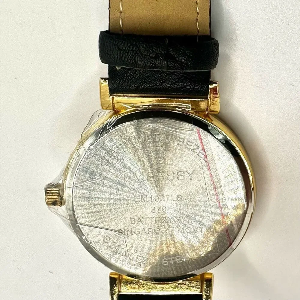 Embassy gold tone rhinestone watch